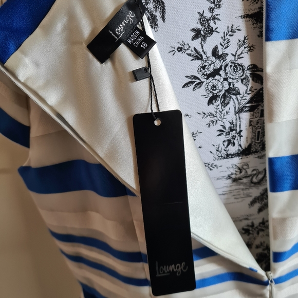 Fabulous statement peplum dress with stripes - Picture 7 of 12